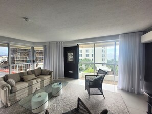 Family Apartment | Living area | 55-inch Smart TV with digital channels, TV, Netflix