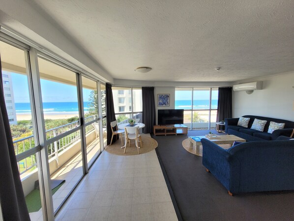 2 Bedroom Apartment (Ocean View, Unit 19)  | Living area | 55-inch Smart TV with digital channels, TV, Netflix
