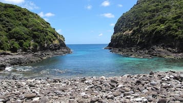 Una spiaggia nelle vicinanze, teli da spiaggia