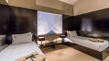 Coffres-forts dans les chambres, fer et planche Ă repasser