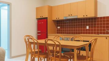 Three-Bedroom Suite with Kitchen | Private kitchen | Coffee/tea maker, electric kettle, toaster
