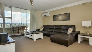 Three Bedroom Apartment | Living area | TV, DVD player - Waterways Luxury Apartments (Gold Coast)