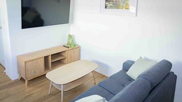 1 Bedroom Apartment | Living room | 32-inch TV with digital channels