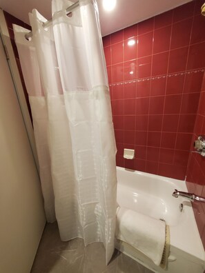 Classic Room, 1 Queen Bed | Bathroom | Combined shower/bathtub, hair dryer, towels - White Knight Motel (Mississauga)