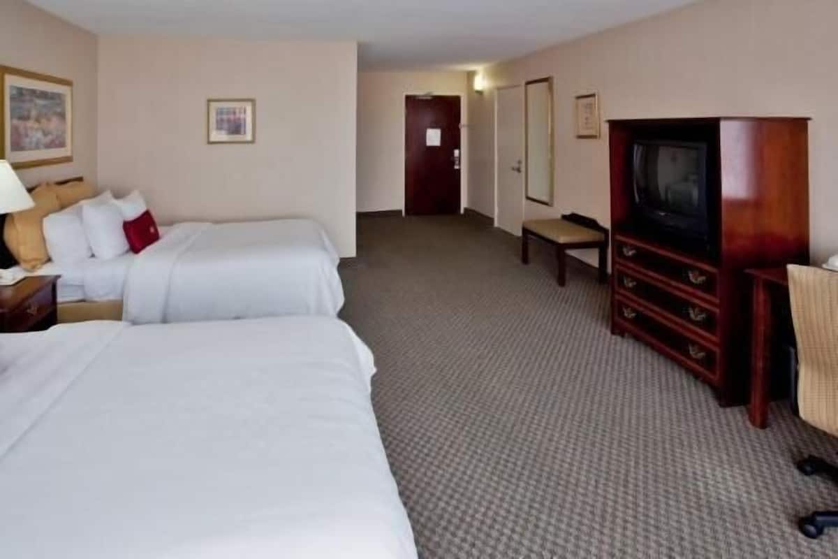 Premium bedding, pillow-top beds, desk, blackout curtains