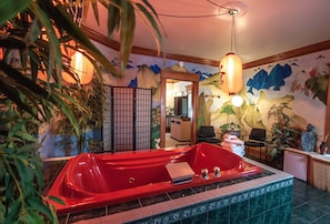 Room (Oriental Gardens) | Bathroom | Combined shower/tub, jetted tub, rainfall showerhead, free toiletries - The Anniversary Inn Logan (Logan)