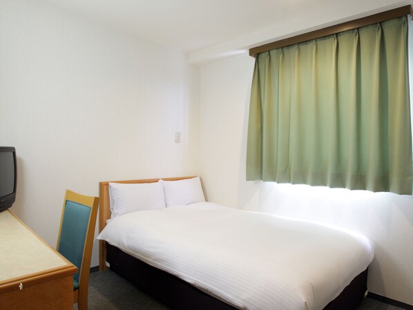 Desk, blackout curtains, free WiFi, bed sheets