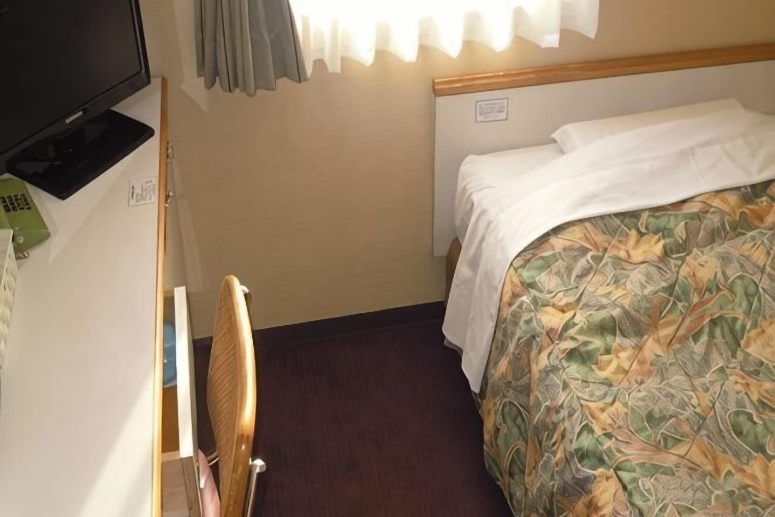 Premium bedding, desk, blackout drapes, iron/ironing board