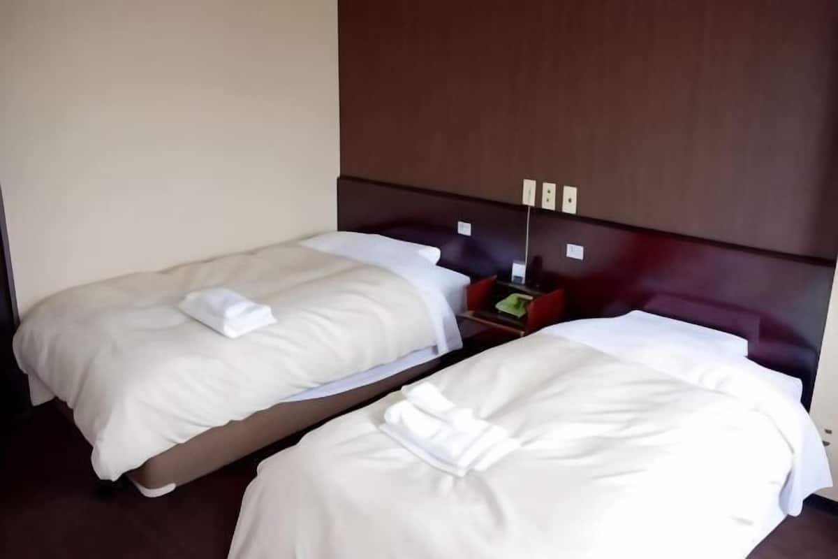 Premium bedding, desk, blackout curtains, iron/ironing board