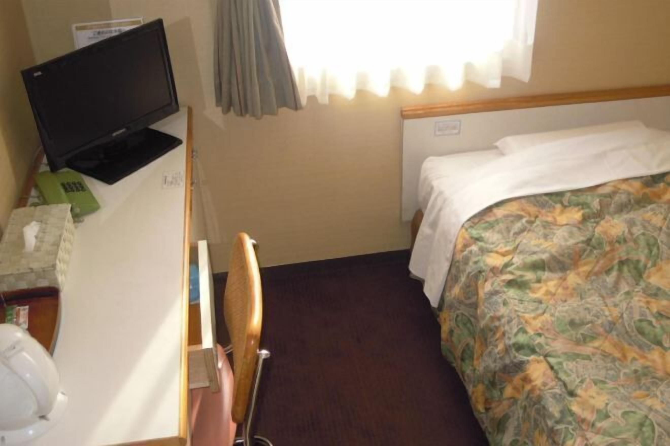 Premium bedding, desk, blackout drapes, iron/ironing board