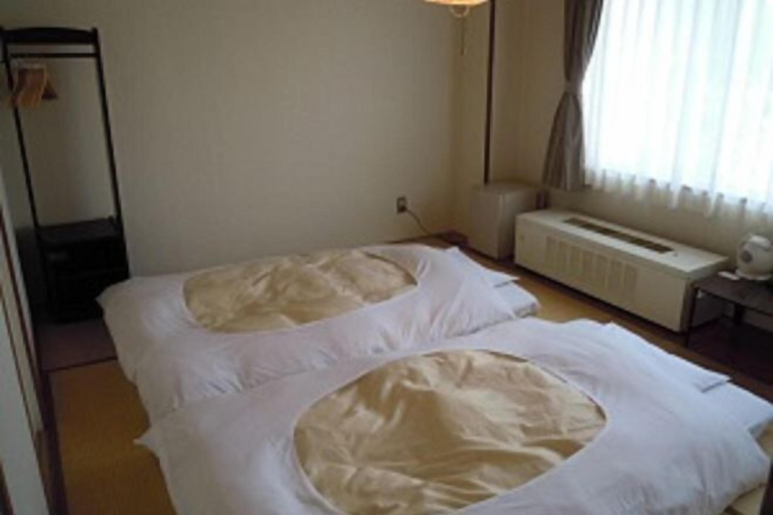 Premium bedding, desk, blackout drapes, iron/ironing board