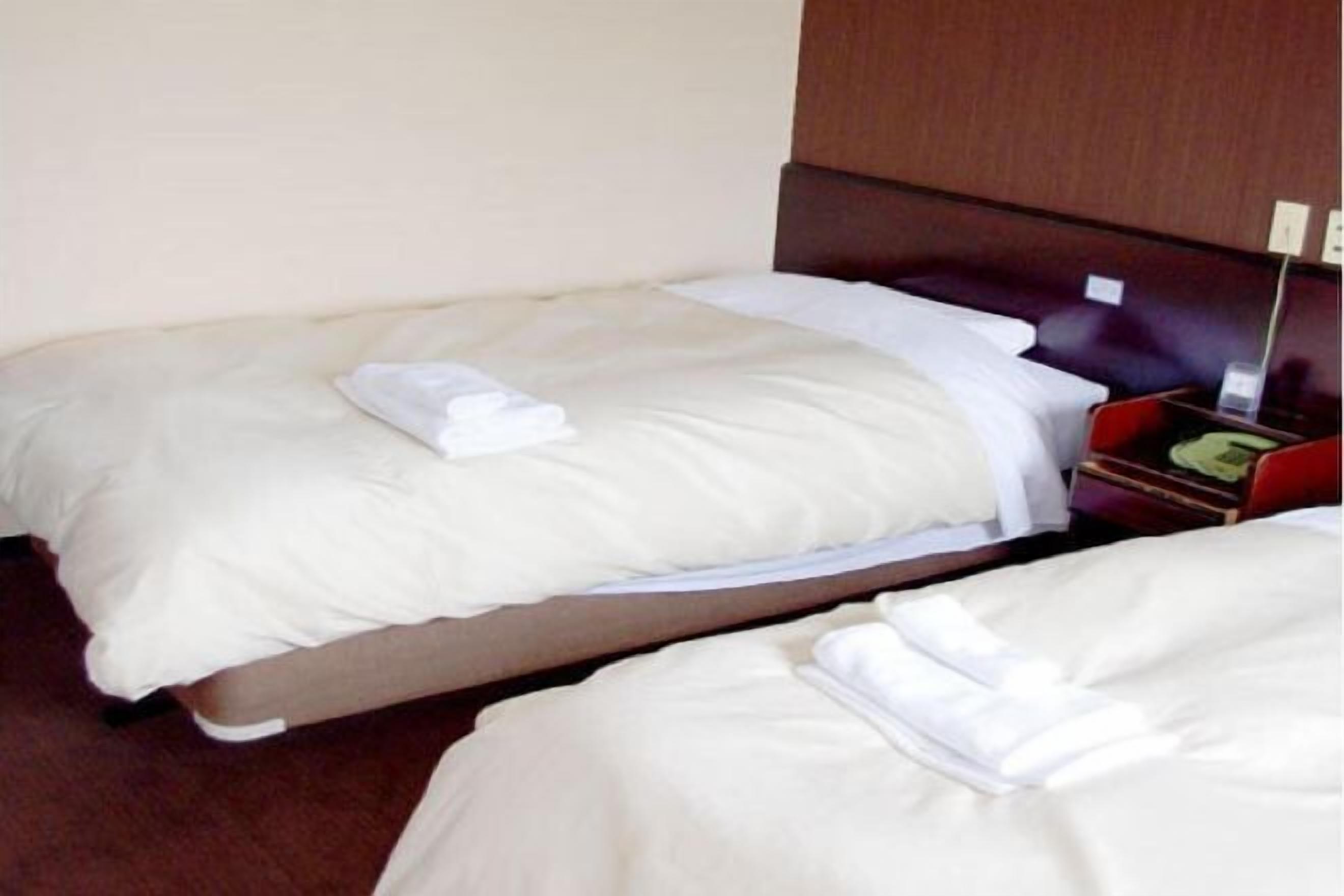 Premium bedding, desk, blackout drapes, iron/ironing board