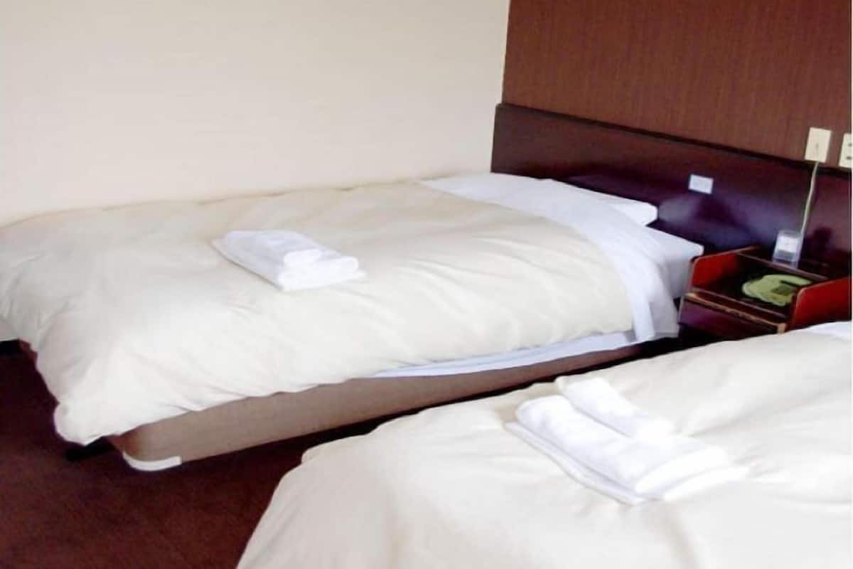 Premium bedding, desk, blackout drapes, iron/ironing board