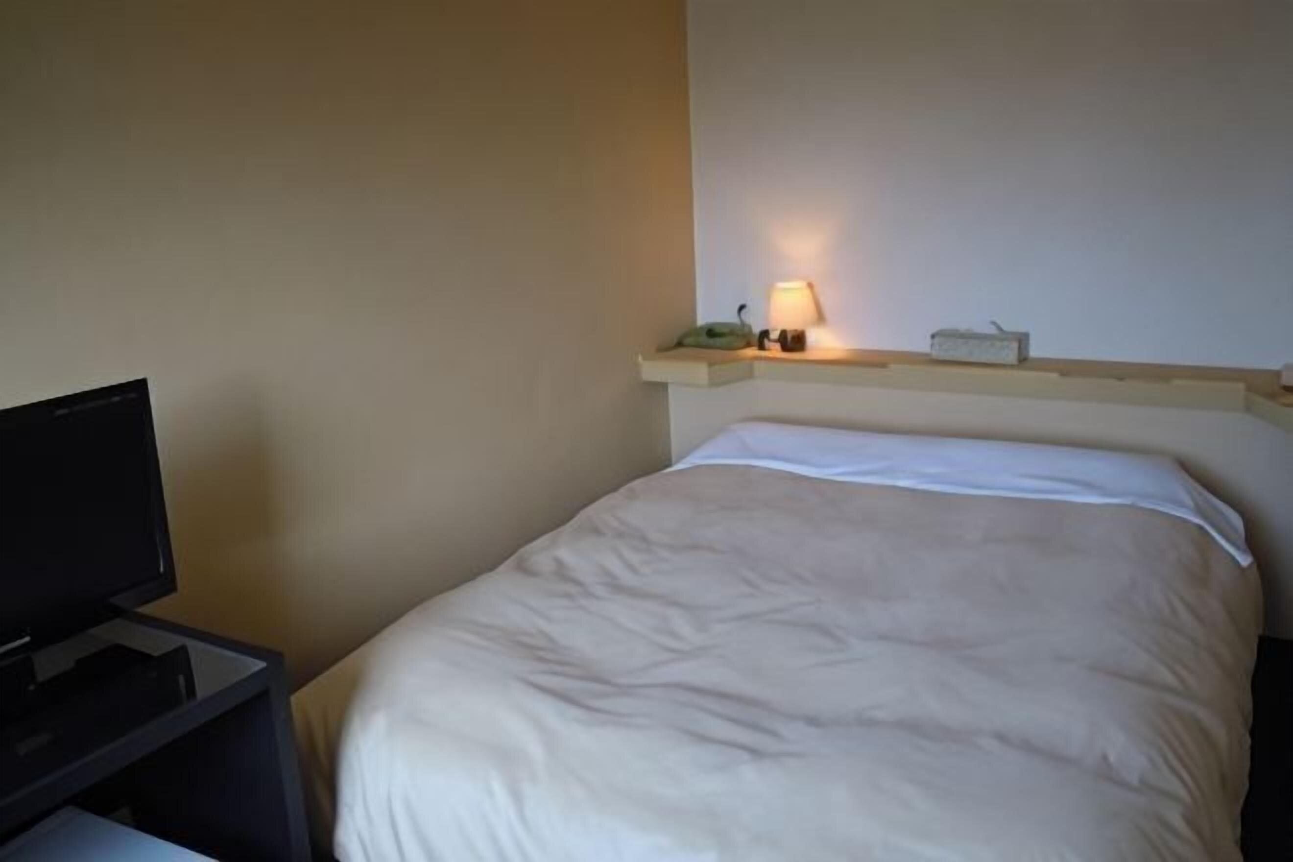 Premium bedding, desk, blackout drapes, iron/ironing board