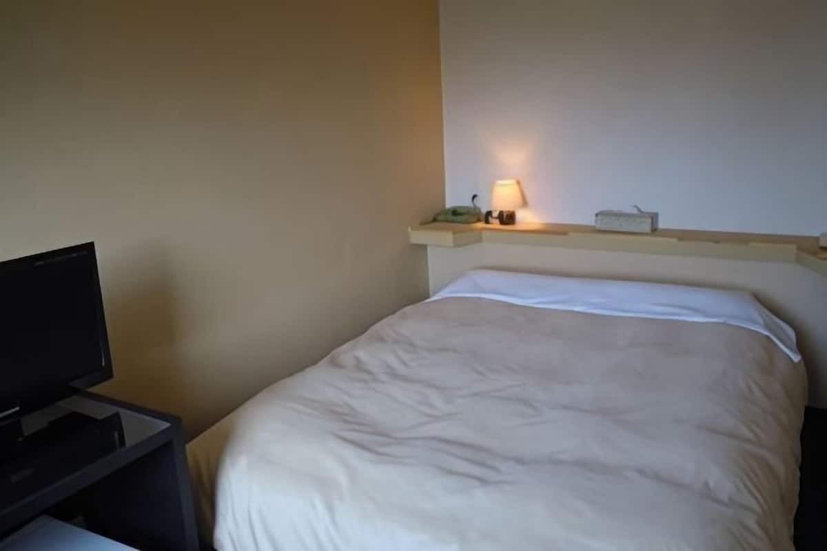 Premium bedding, desk, blackout drapes, iron/ironing board