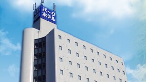 A tall, modern building with a white facade and numerous windows. - Niigata Park Hotel (Niigata)