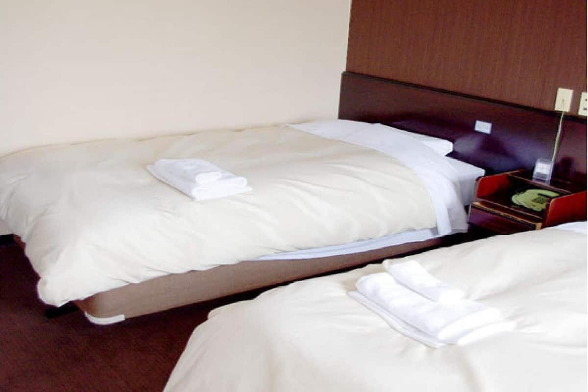 premium bedding, desk, blackout curtains, iron/ironing board