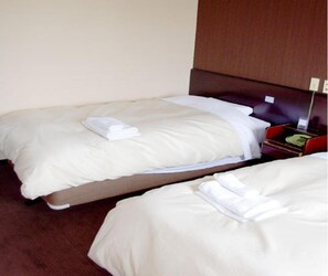 Premium bedding, desk, blackout drapes, iron/ironing board