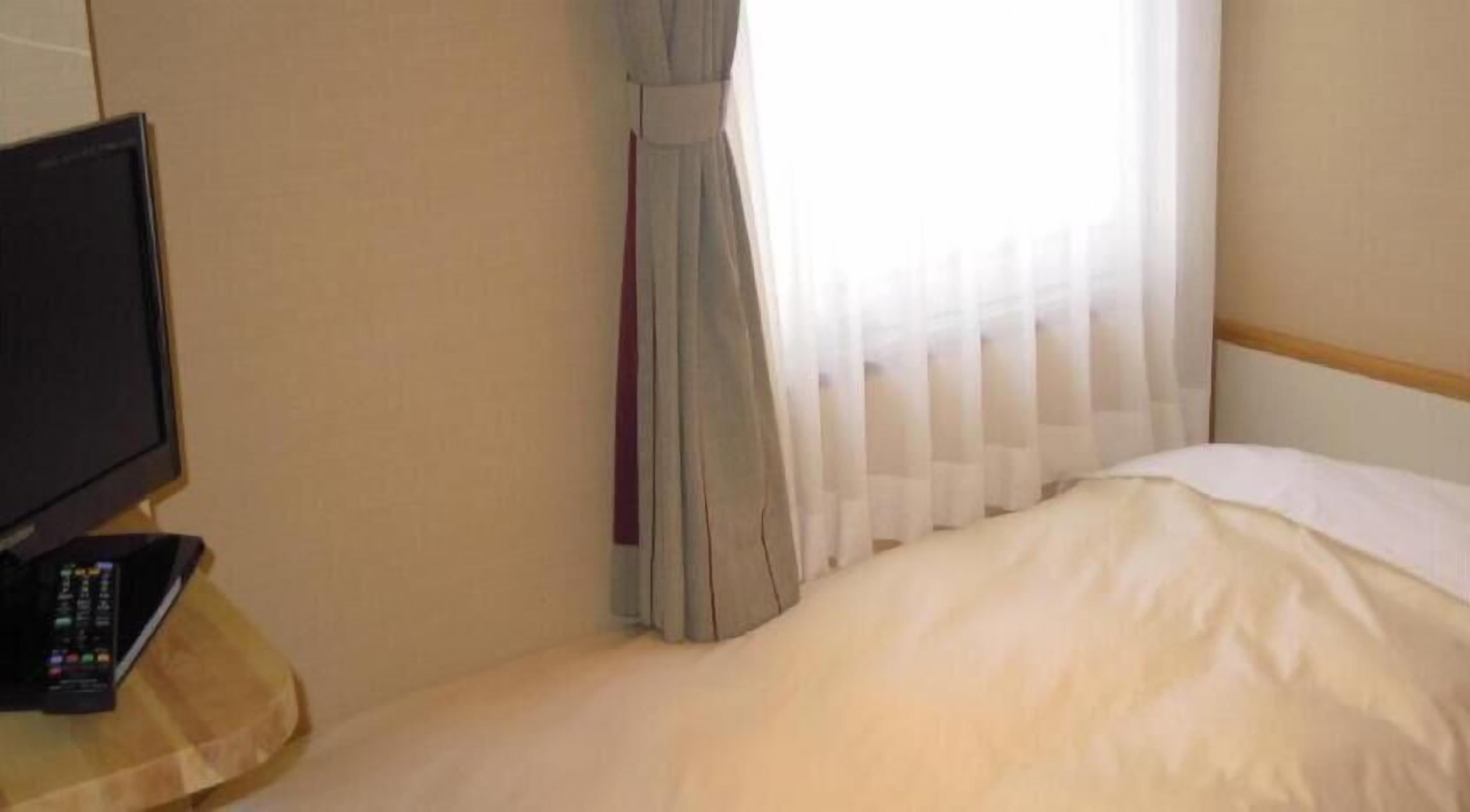 Premium bedding, desk, blackout curtains, iron/ironing board