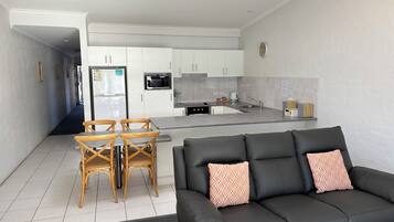Deluxe Apartment, 2 Bedrooms, Lake View (Upstairs) | Private kitchen | Full-size fridge, microwave, oven, stovetop