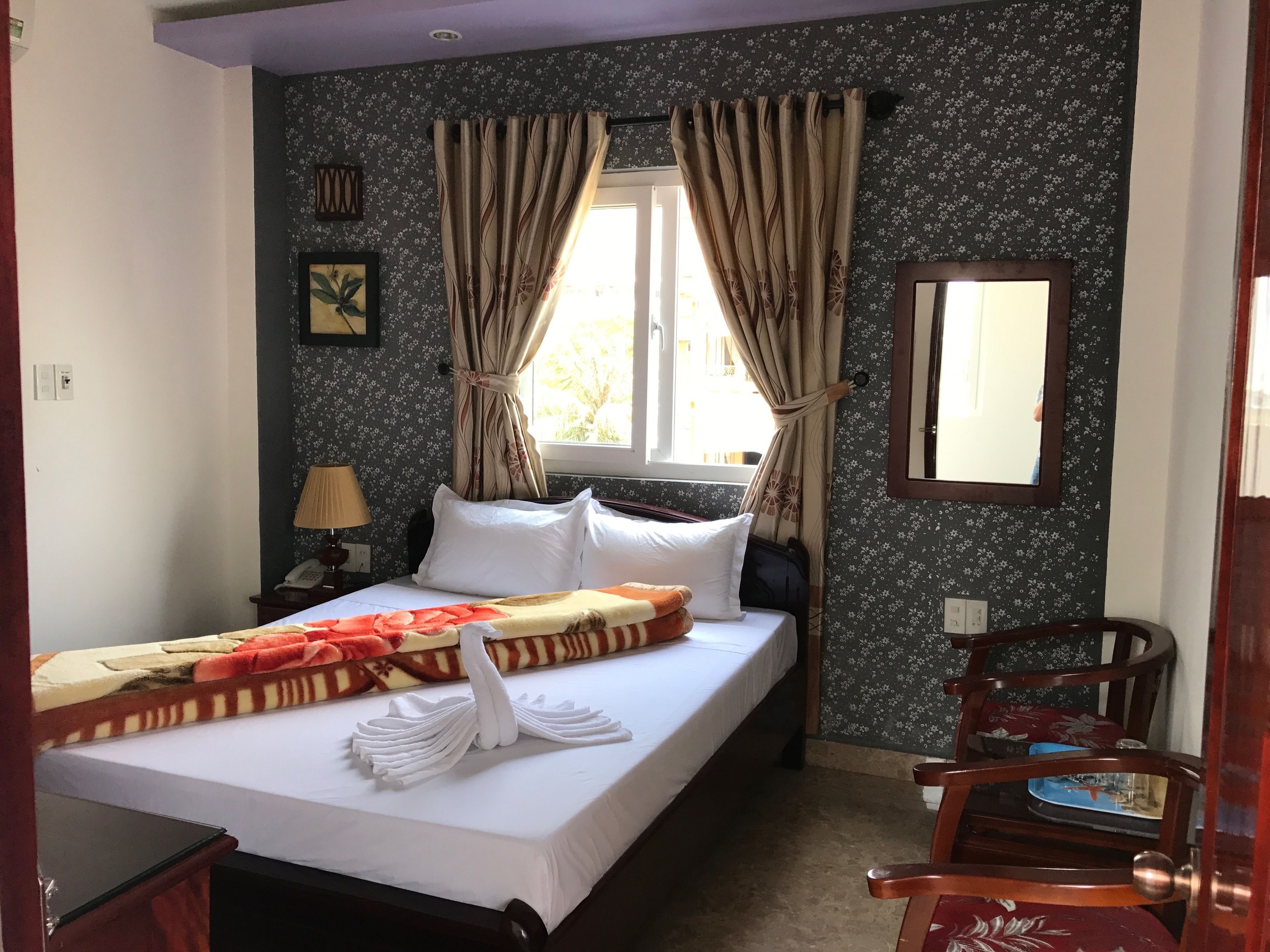 standard double room | minibar, individually furnished, desk, blackout curtains