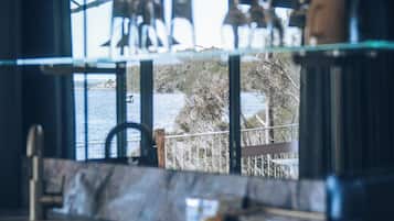 Maugean Suite | Living area | TV, fireplace