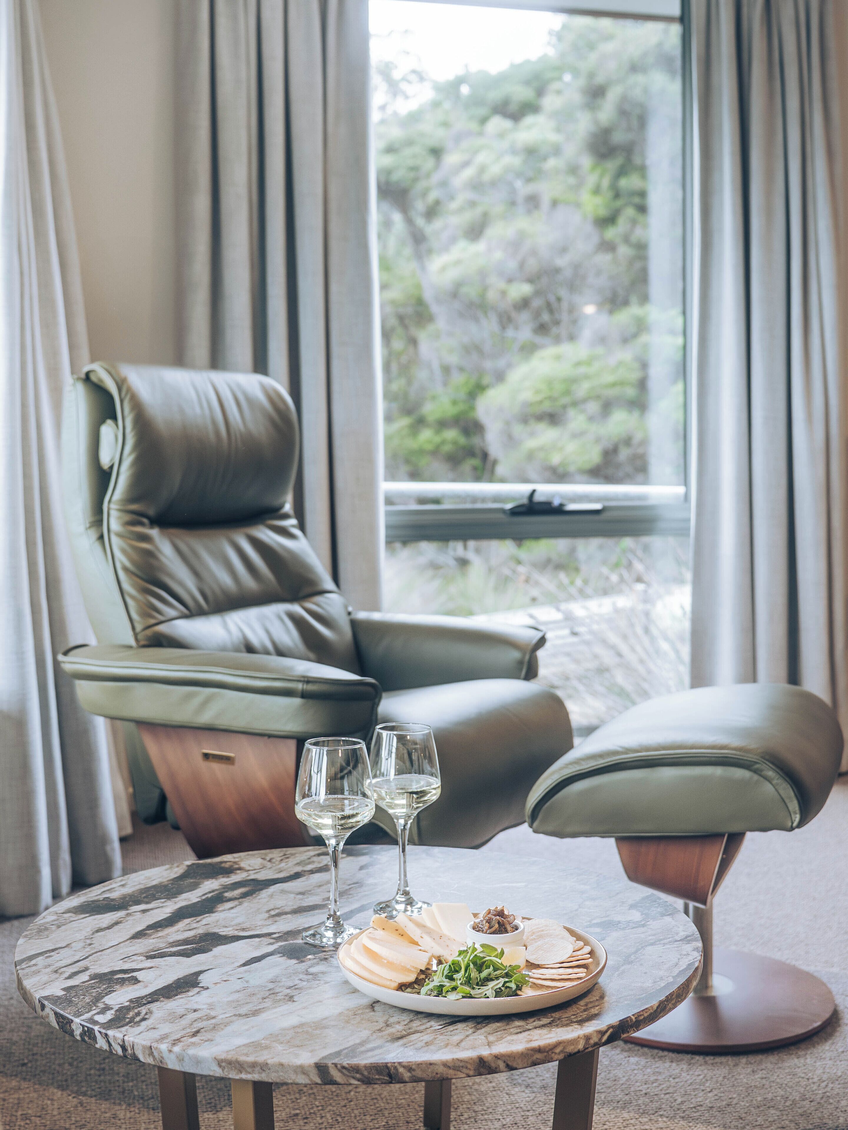 The Cove Pavilions | Living area | TV, fireplace