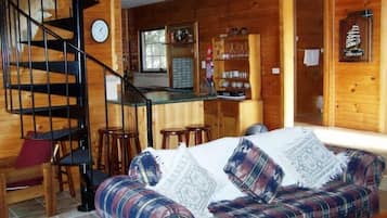 Cottage, 3 Bedrooms | Living area | Flat-screen TV, DVD player