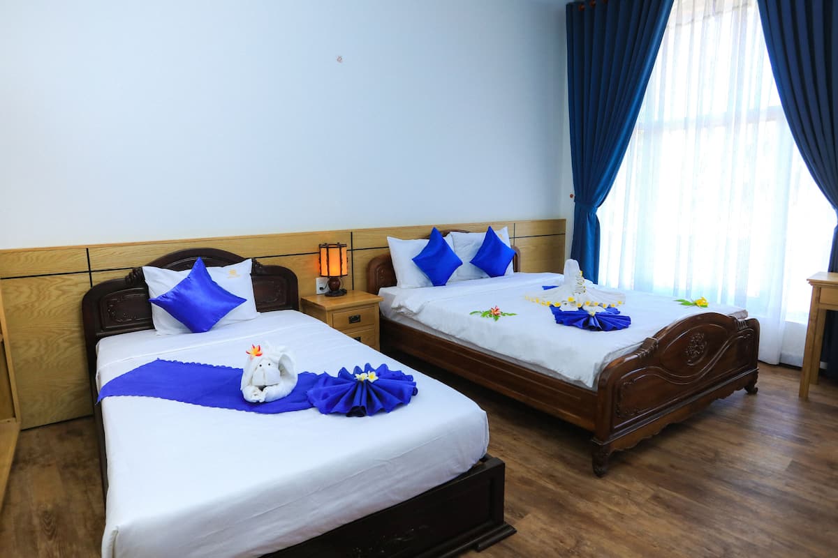 Luxury Suite, 1 Bedroom, Beach View | Minibar, in-room safe, desk, soundproofing