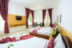 Habitación triple Deluxe, vistas al mar | Vistas al mar