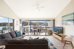 Two Bedroom Apartment with Lake View | Living room | Plasma TV, DVD player - Sails Luxury Apartments Merimbula (Merimbula)