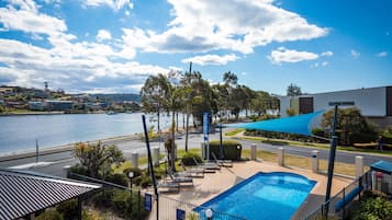 Outdoor pool, a heated pool, sun loungers