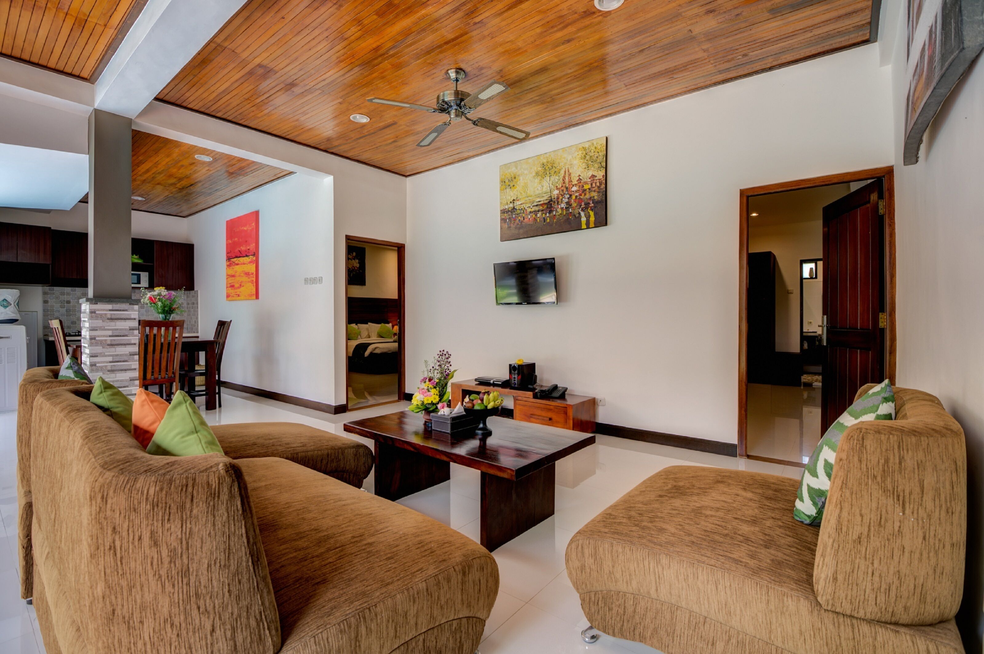 deluxe villa, 2 bedrooms, private pool | living room | 32-inch tv with cable channels