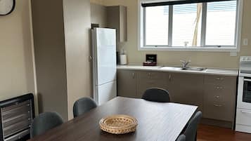 Cottage, 3 Bedrooms | Private kitchen | Fridge, microwave, highchair
