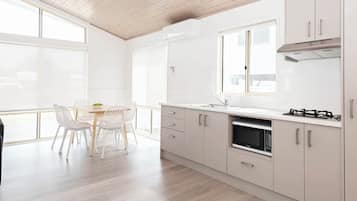 Superior Beach Comber | Private kitchenette | Full-size fridge, microwave, toaster, cookware/dishes/utensils