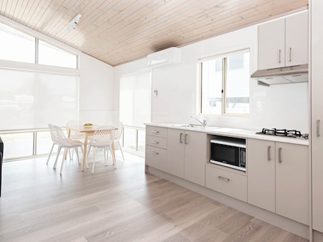 Superior Beach Comber | Private kitchenette | Mini-fridge, microwave, toaster, dining tables