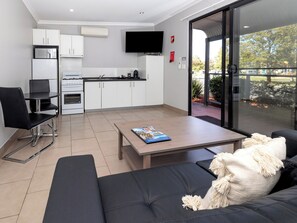 Superior 1 Bedroom Cabin | Living area | TV, table tennis - BIG4 Mudgee Holiday Park (Mudgee)