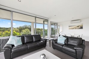 XTwo Bedroom Garden View Apartment - 319 | Living room | TV