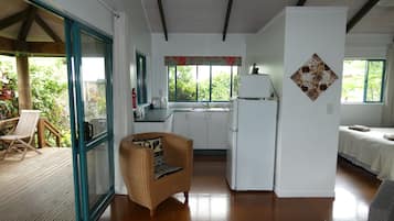 Bungalow | Private kitchen | Full-size fridge, microwave, stovetop, electric kettle