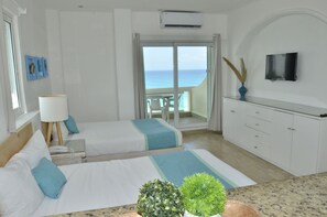 Standard Quadruple Room | Premium bedding, in-room safe, free WiFi, bed sheets - Amigo Rental (Cancun)