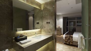 Superior Room, 1 King Bed | Bathroom | Shower, free toiletries, hair dryer, slippers