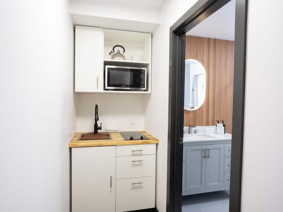 Classic Two Queen Room with Kitchenette | Private kitchenette | Coffee/tea maker, mini-fridge, microwave, stovetop