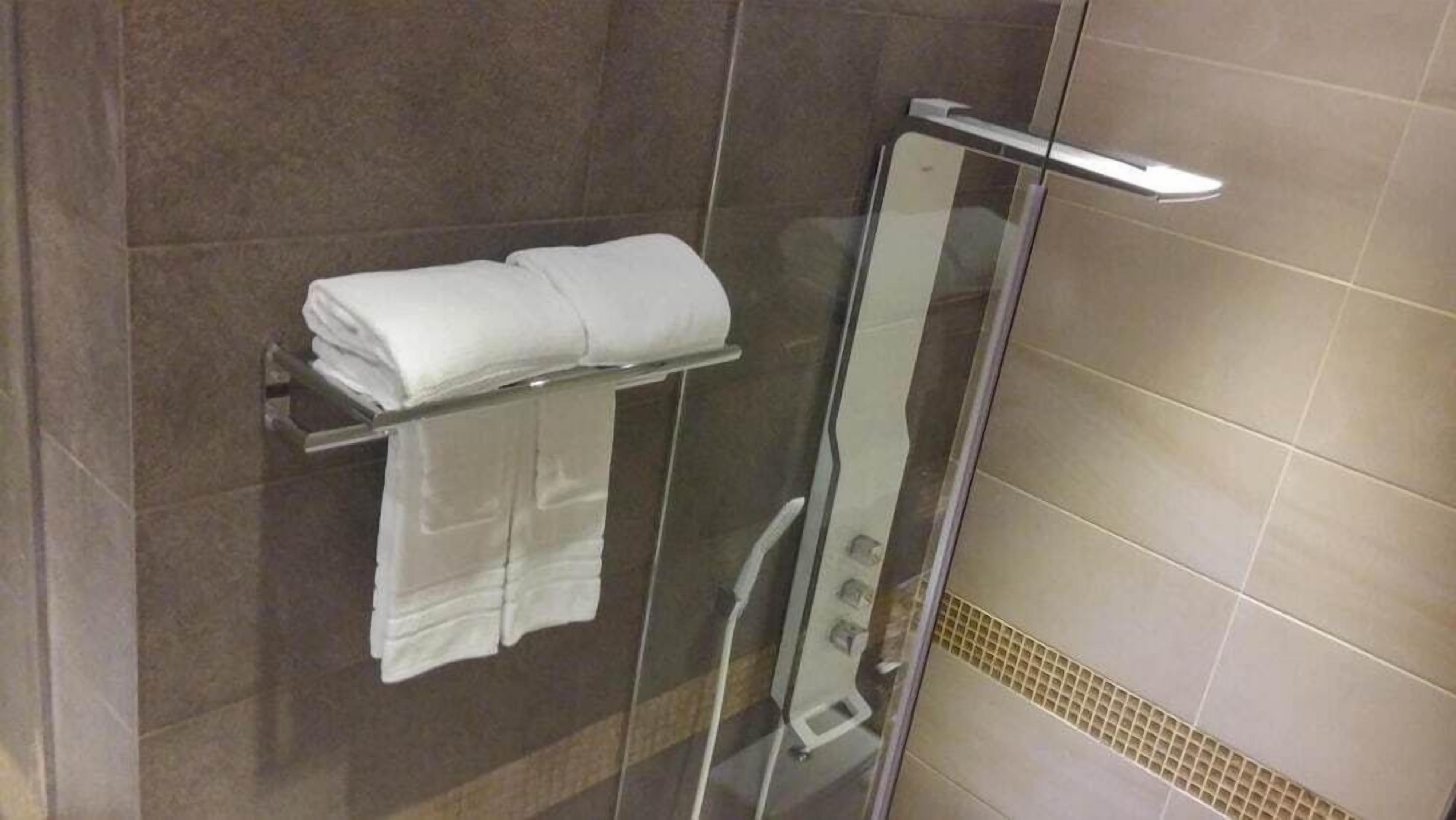 shower, designer toiletries, hair dryer, bathrobes