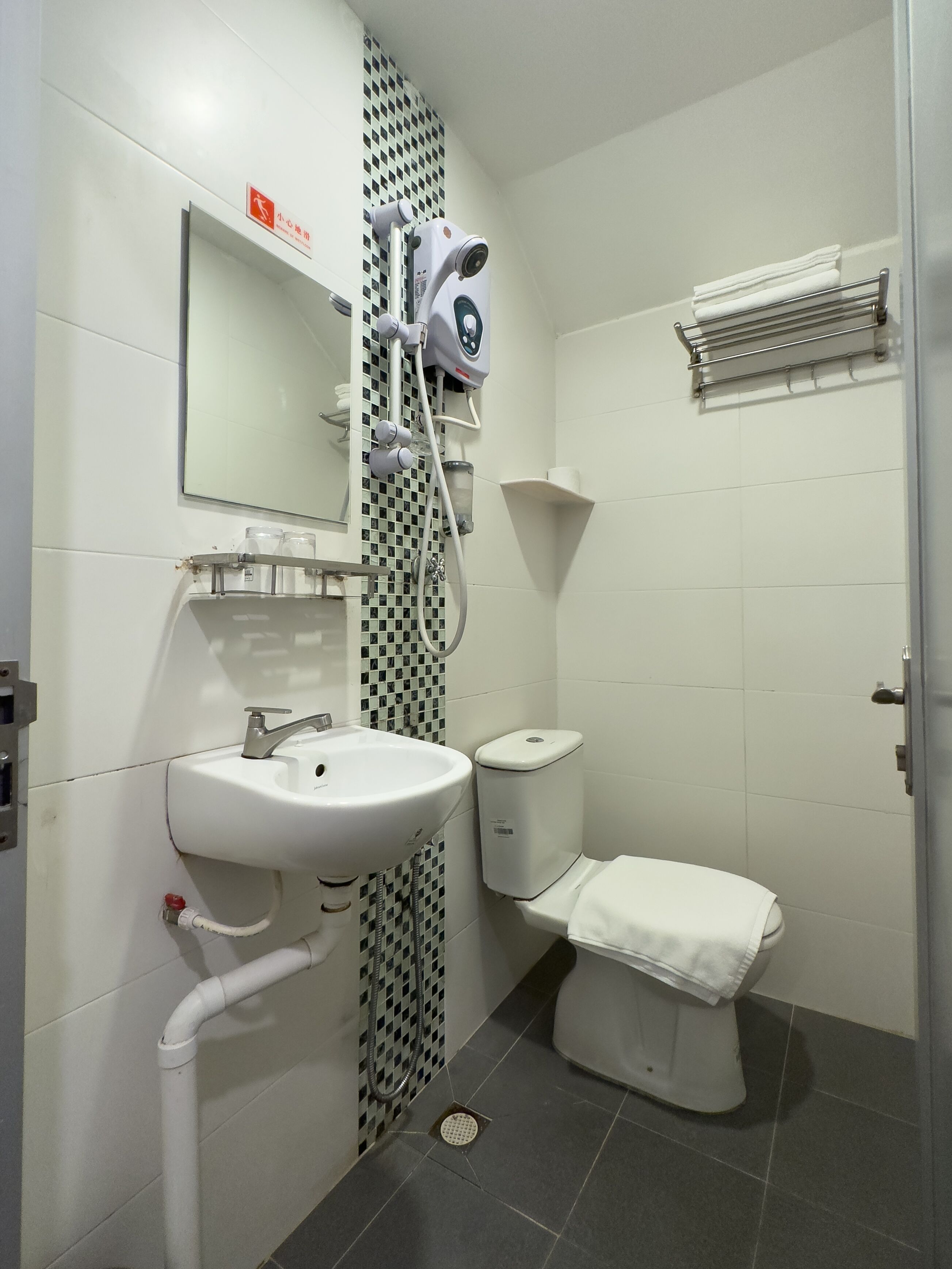 triple room without window | bathroom | shower, free toiletries, hair dryer, towels