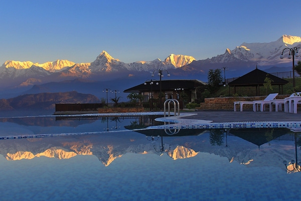 Outdoor pool, open 8:00 AM to 7:00 PM, sun loungers