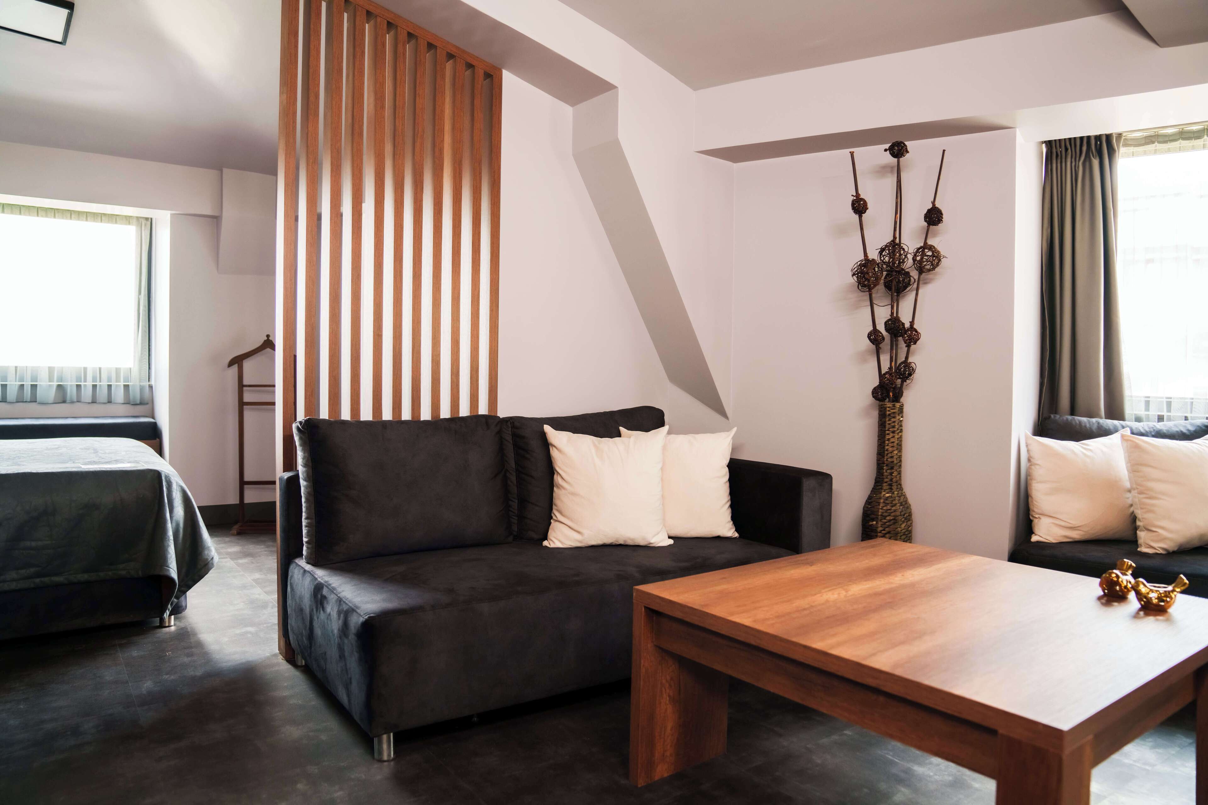 corner suite room | premium bedding, minibar, in-room safe, soundproofing