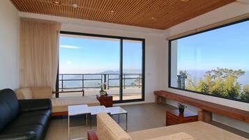 Modern style building- Deluxe Quadruple Room, 2 Queen Beds, Balcony | Premium bedding, laptop workspace, soundproofing, free WiFi