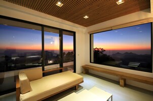 Modern style building- Deluxe Quadruple Room, 2 Queen Beds, Balcony | Premium bedding, laptop workspace, soundproofing, free WiFi