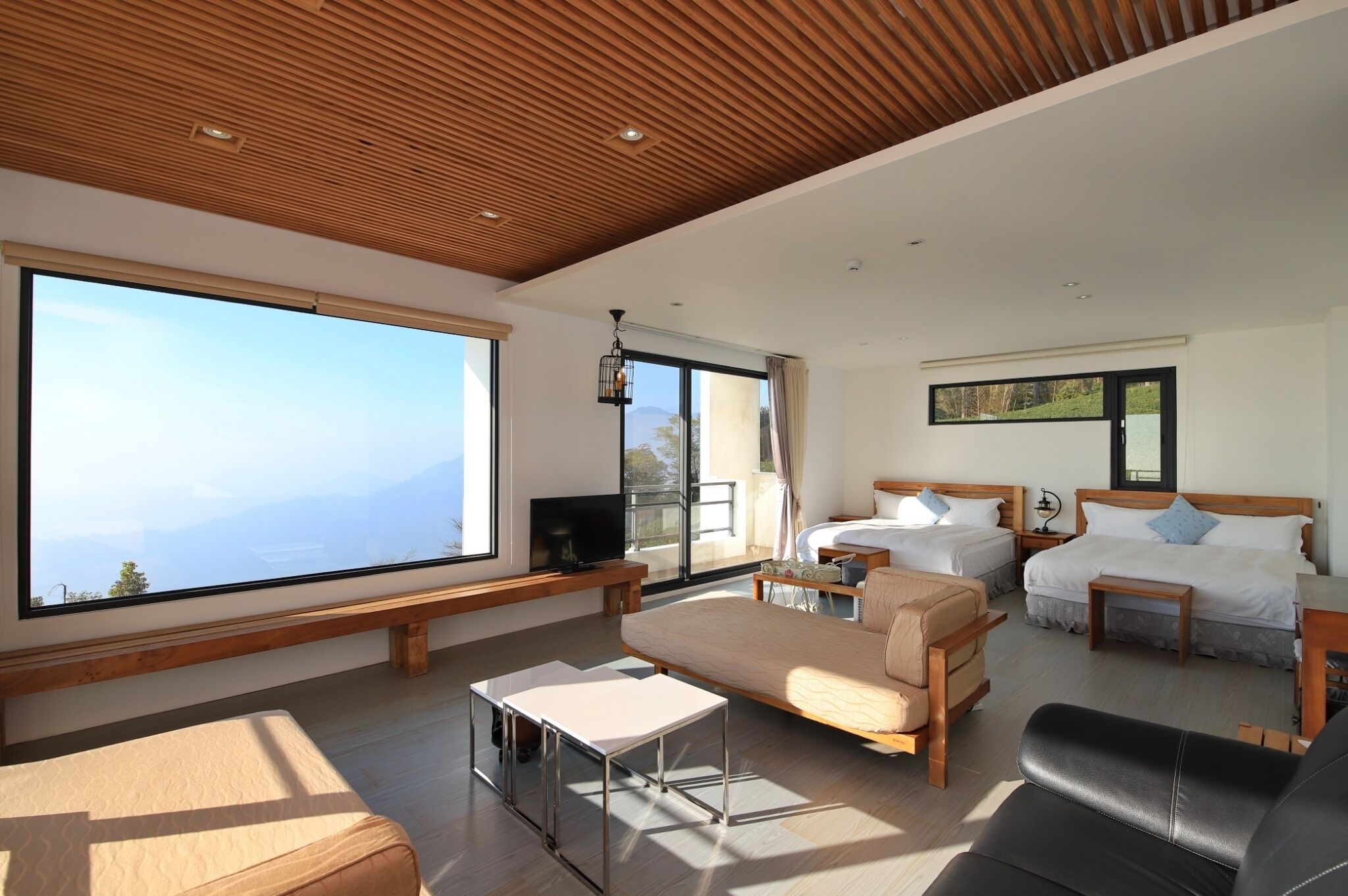 Modern style building- Deluxe Quadruple Room, 2 Queen Beds, Balcony  | Premium bedding, laptop workspace, soundproofing, free WiFi