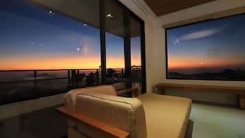 Modern style building- Deluxe Quadruple Room, 2 Queen Beds, Balcony | Premium bedding, laptop workspace, soundproofing, free WiFi